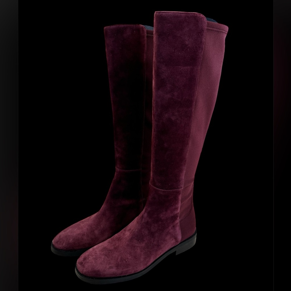 Stuart Weitzman maroon boots.